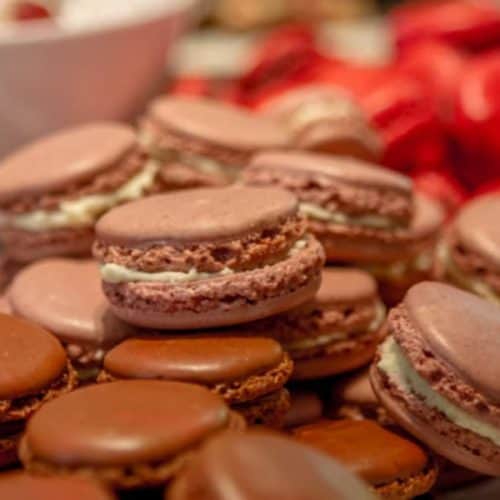 A plate of chocolate macarons