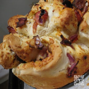 Image of a full pull a part with bacon and red onion