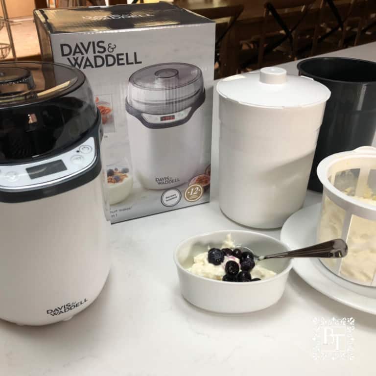 White bench with a Davis and Waddell yoghurt maker with all the components displayed.