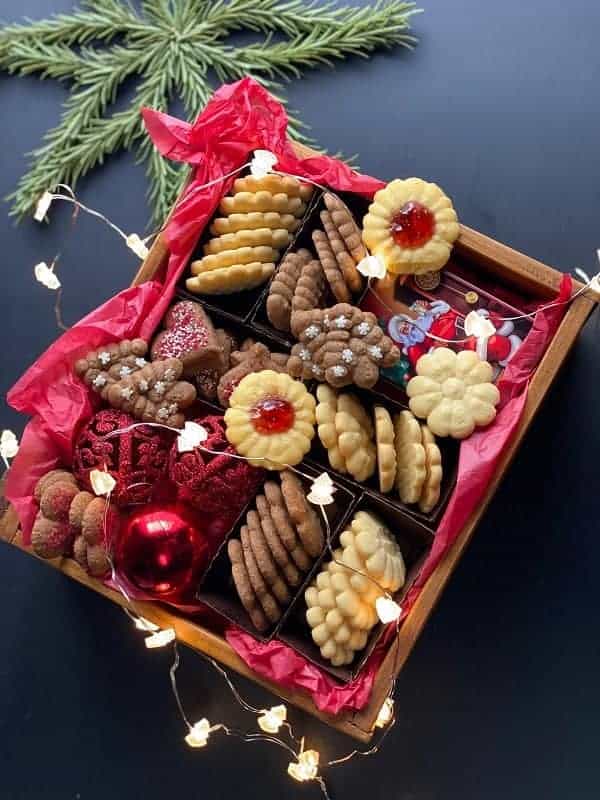 Wooden Christmas box with Cookie press Cookies.