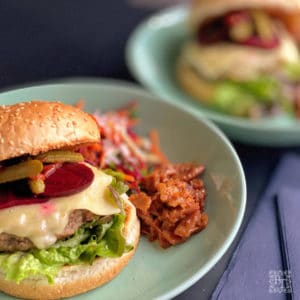 Hamburgers on a plate with Bacon jam on the side
