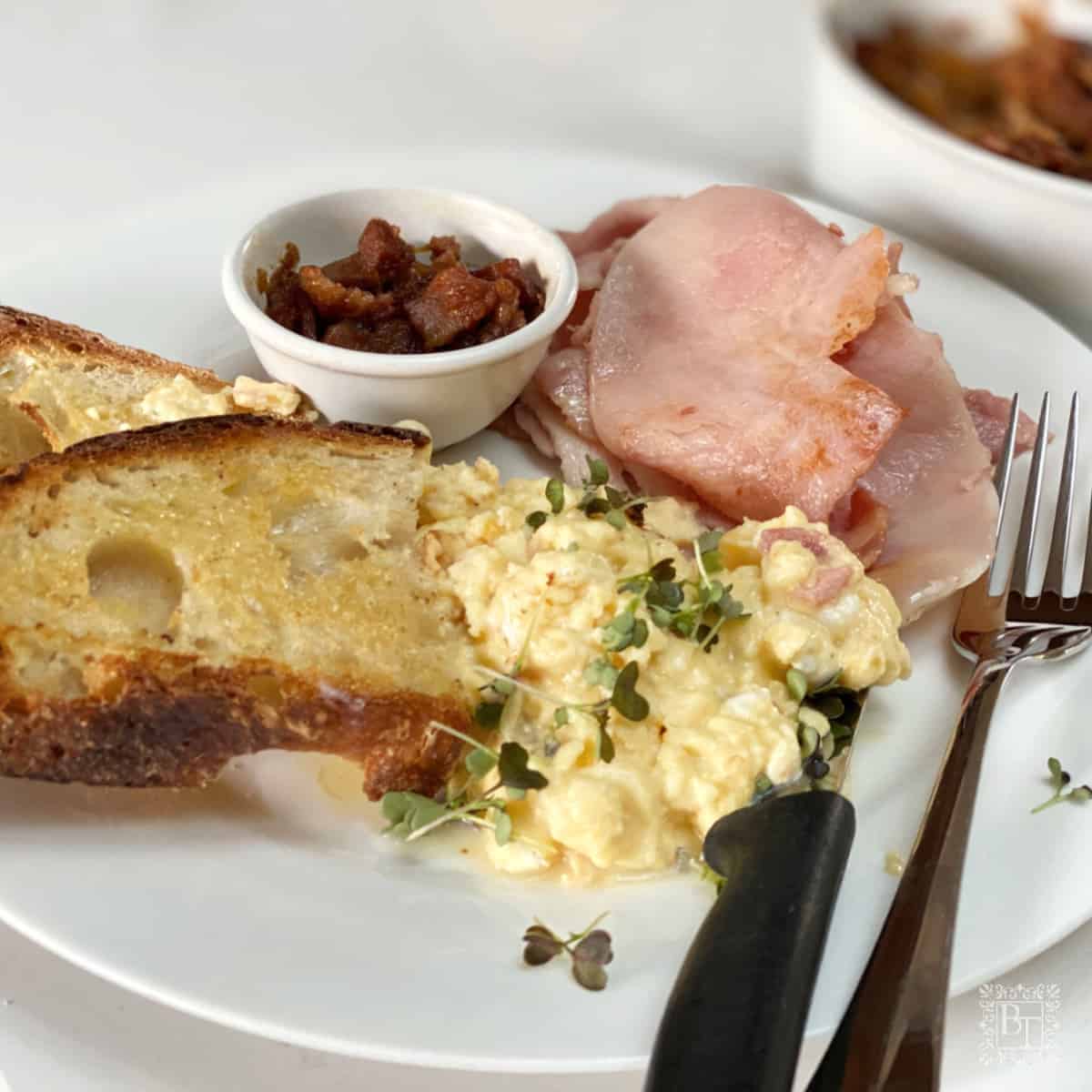 Scrambled eggs with Bacon jam on the side.