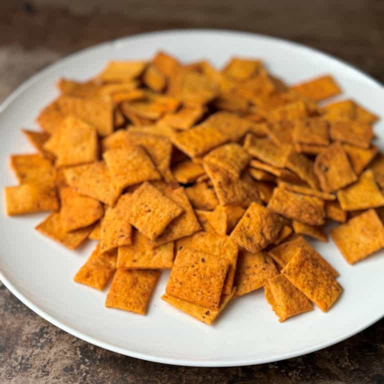 A white plate filled with savoury shapes.